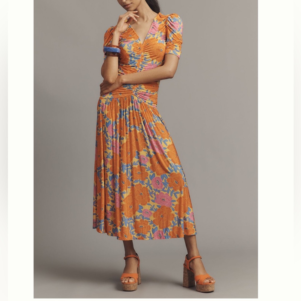 Farm Rio x Anthropologie Short-Sleeve V-
Neck Ruched Midi Dress. MSRP $248.